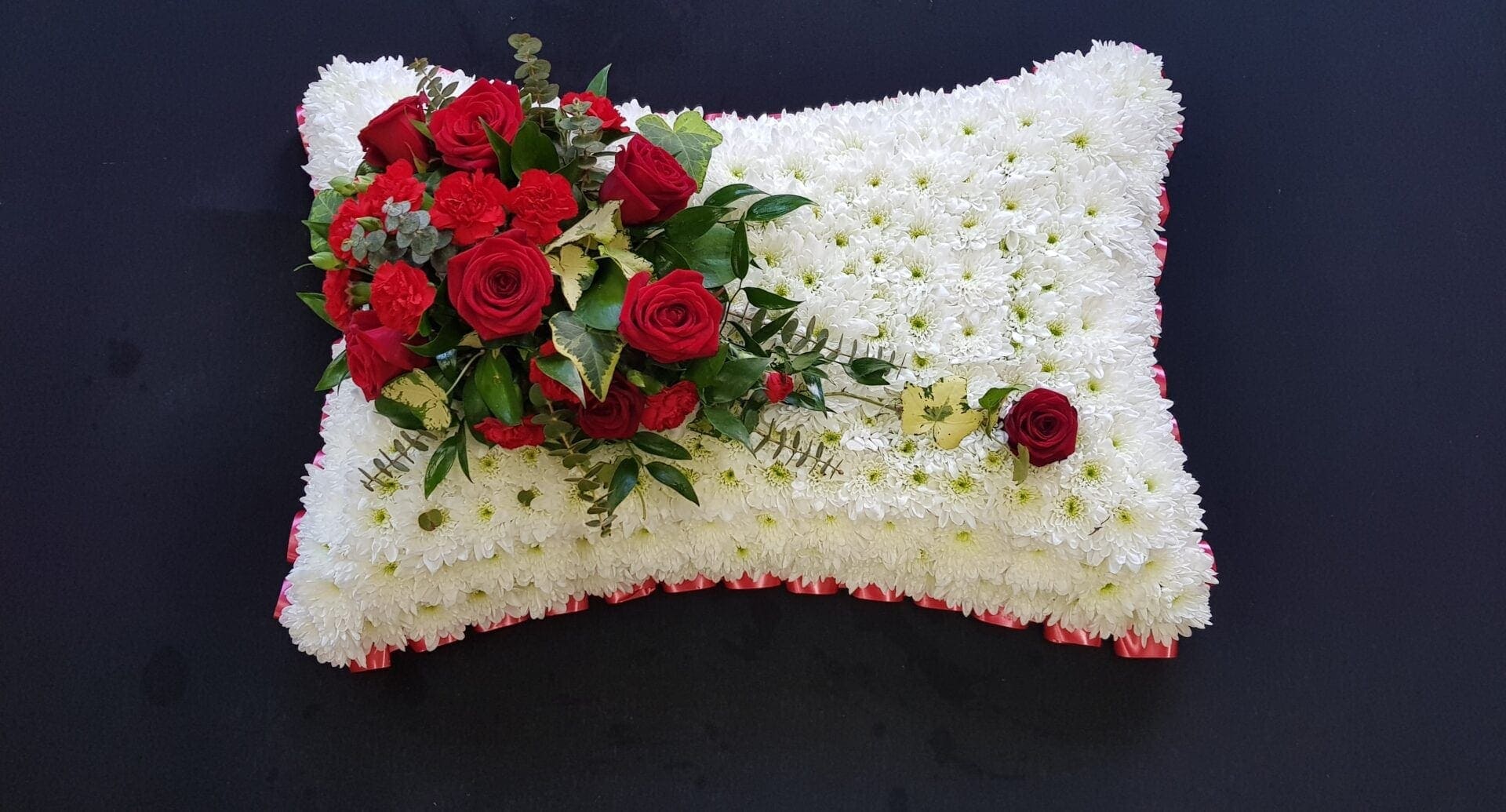20200309 093250 scaled Red roses and white flower funeral pillow tribute