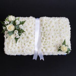 White chrysanthemum and rose funeral open book tribute