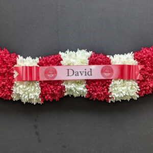 Red and white flower funeral scarf tribute