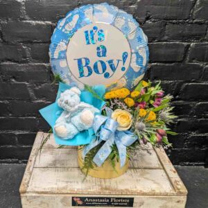 Baby boy gift set with teddy bear and flowers