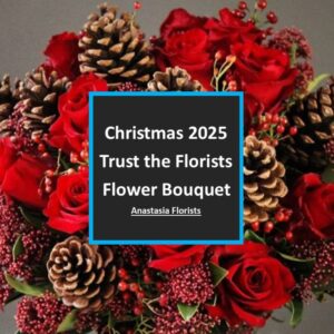 Christmas flower bouquet with red roses and pinecones
