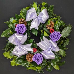 Christmas Holly Wreath 7 Festive holly wreath with purple roses and pinecones