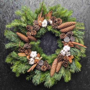 Rustic Christmas wreath with pinecones and cinnamon