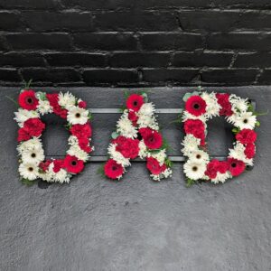 Red and white floral DAD tribute letters for funeral