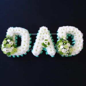 White and green funeral DAD floral tribute
