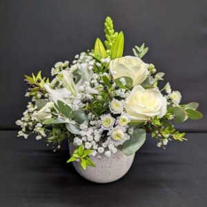 Naomi Flower Pott White roses and lilies in a Naomi Pot