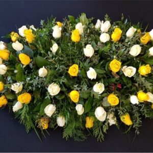 White and yellow rose funeral coffin spray tribute