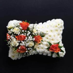 White chrysanthemums with orange roses funeral pillow tribute