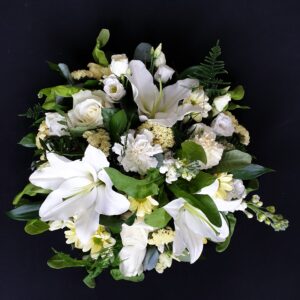 White lily and rose funeral posy tribute