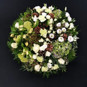 Elegant funeral posy with white and green flowers
