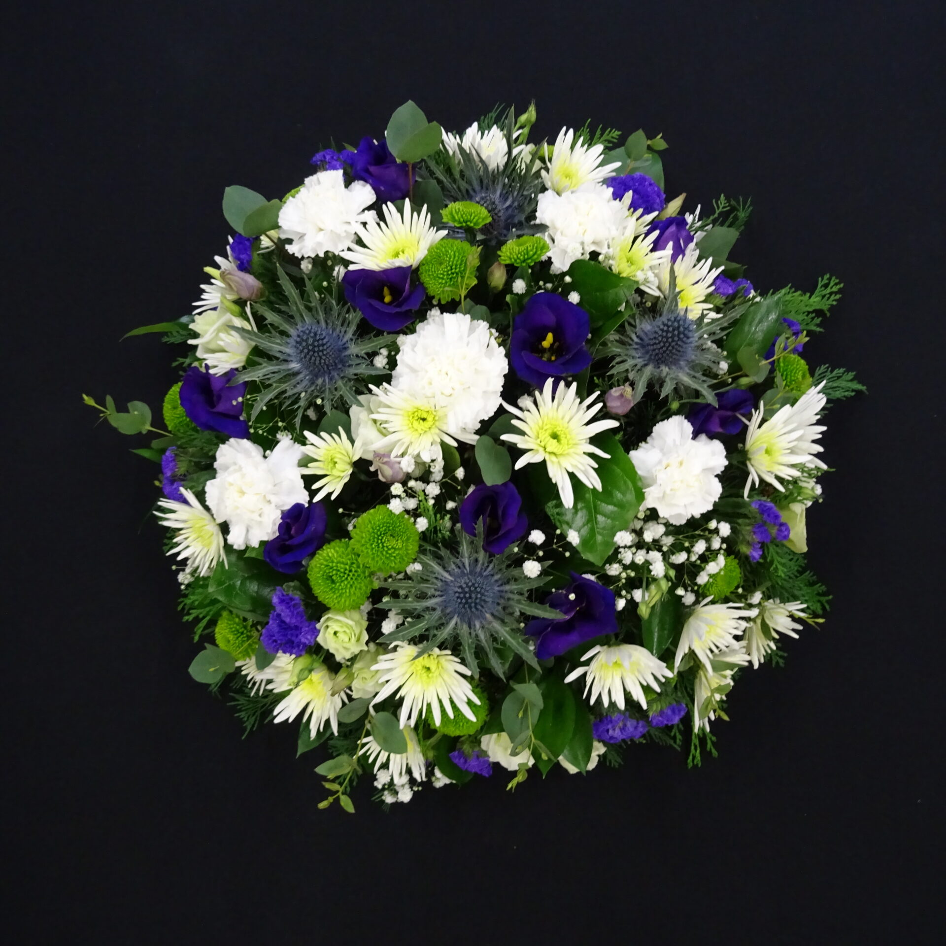 Posy 7 scaled White and purple funeral posy tribute with mixed flowers