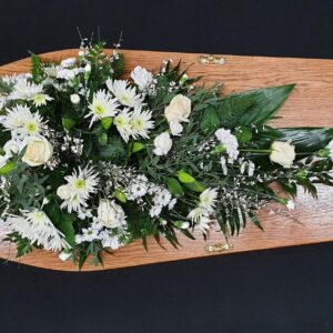 White rose and chrysanthemum funeral spray tribute