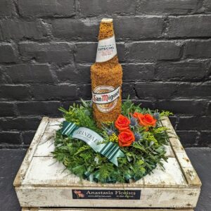 Bottle of beer | San Miguel | Funeral flowers | Aberdeen florist