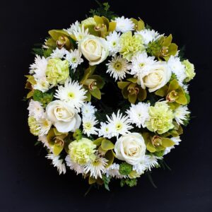White rose and daisy funeral wreath